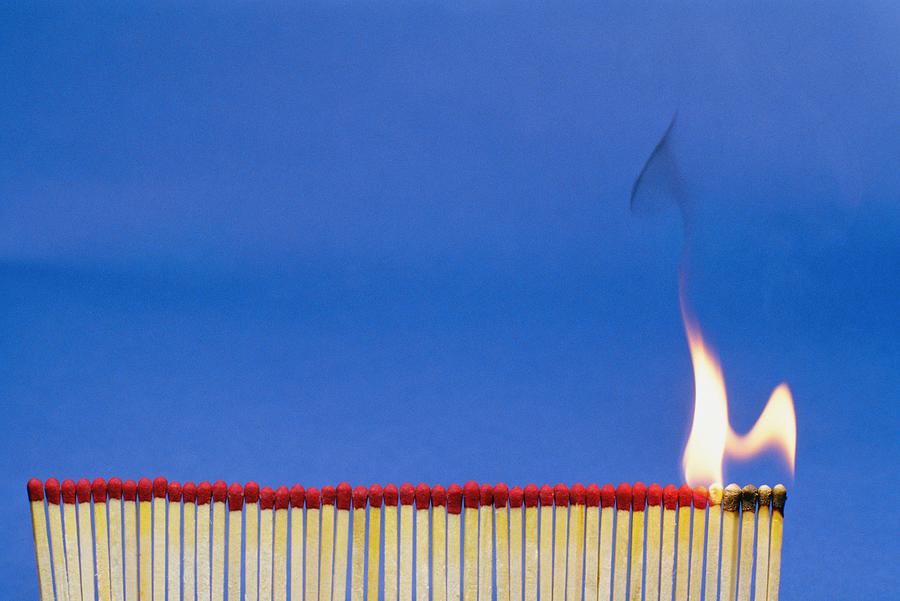Close-up of matchsticks burning Photograph by Glowimages