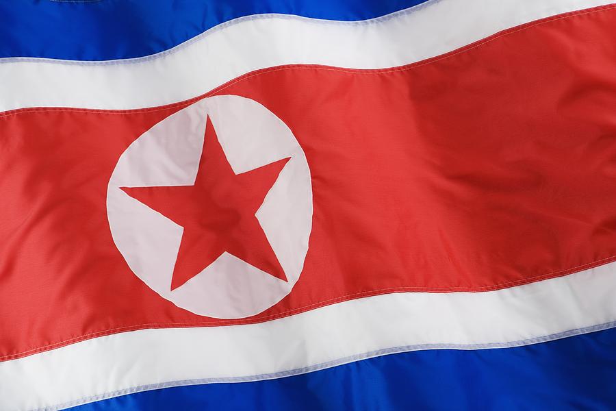 Close up of North Korean flag Photograph by Tetra Images