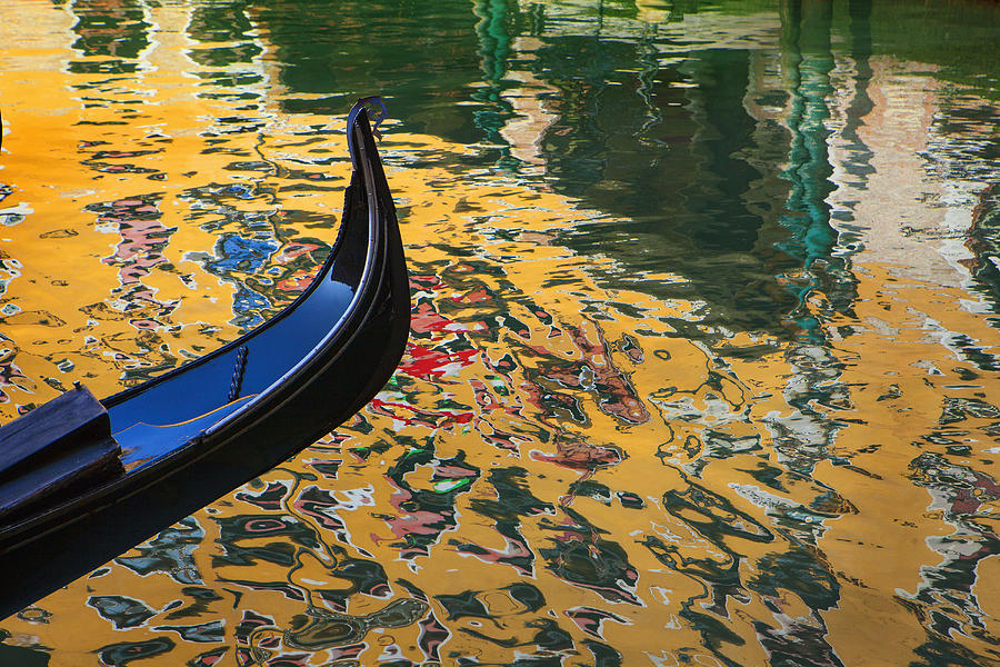 Close up of ornate gondola on canal Photograph by Chris Clor
