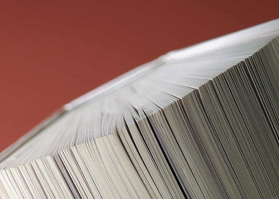 Close-up of pages of a closed book Photograph by Medioimages/Photodisc