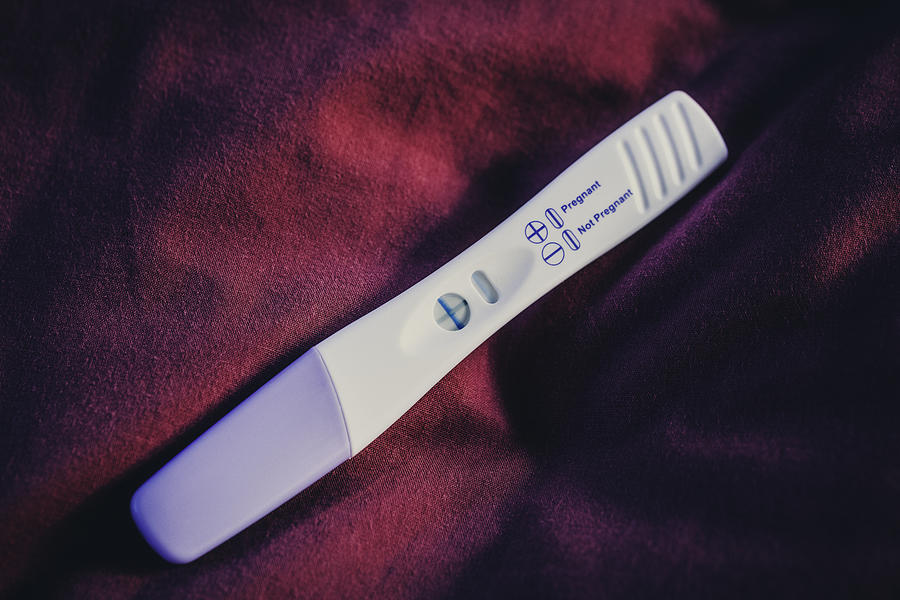 Close Up of Positive Pregnancy Test Photograph by Torresigner