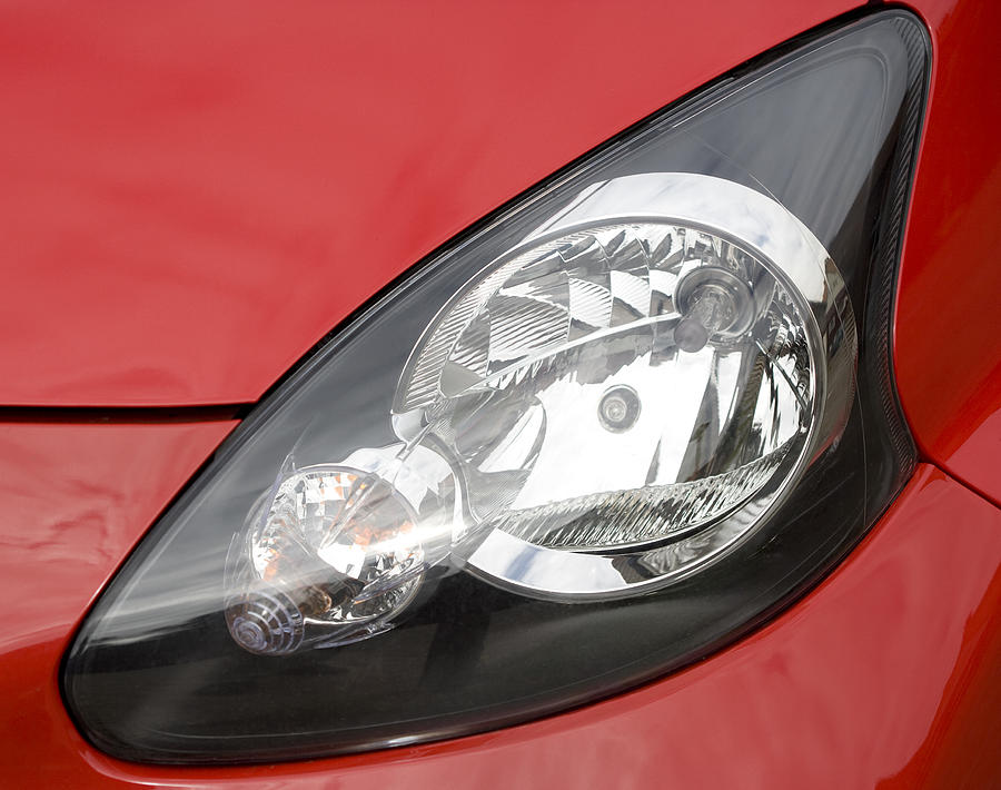 Close-up of red Car headlight Photograph by RelaxFoto.de