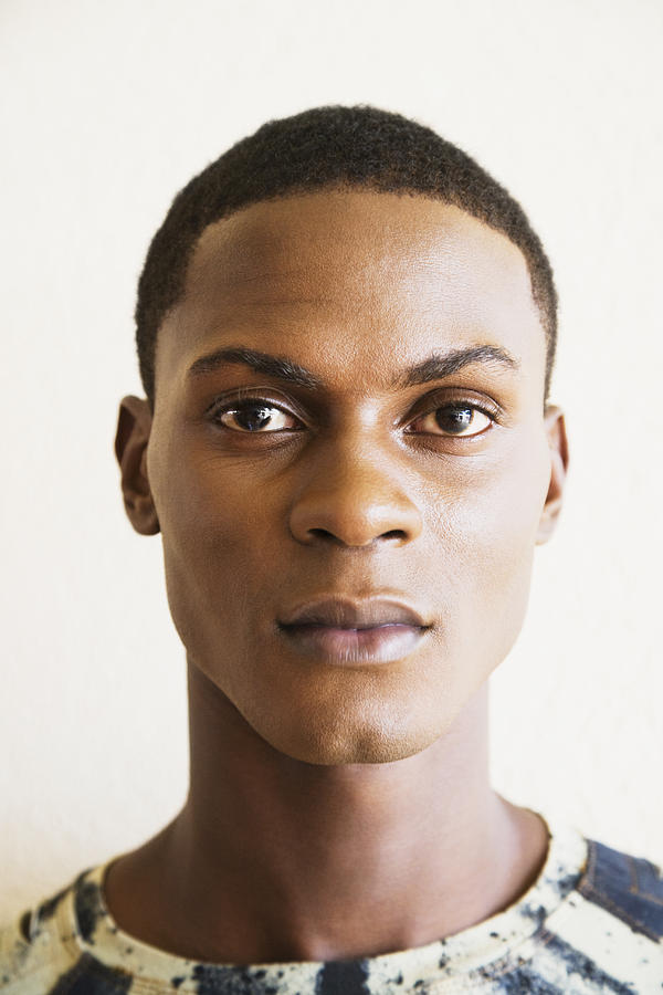 Close up of serious African man Photograph by Jack Hollingsworth