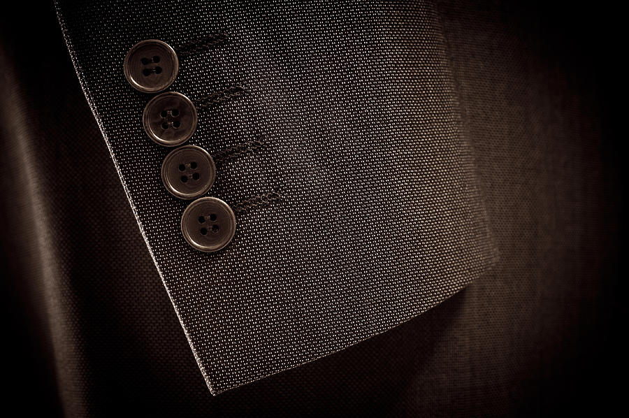 Close-up of suits sleeve and buttons in brown colour Photograph by Domin_domin