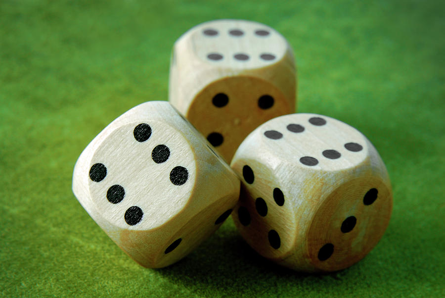 Close Up Of The Dices On Green Table Photograph by Severija Kirilovaite