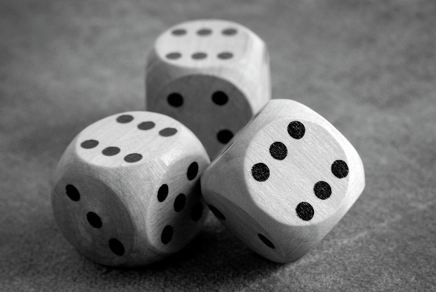 Close Up Of The Dices On Table In Black And White Photograph by Severija Kirilovaite