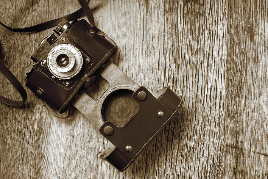 Close Up Of The Vintage Old Film Photo Camera In Sepia Color Photograph by Severija Kirilovaite