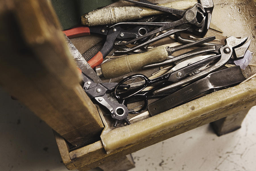 Close up of tool box and hand tools in shoe makers workshop Photograph by Dan Prince