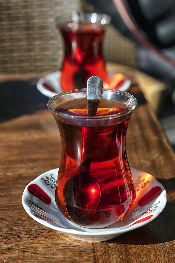 Close up of Turkish tea served in typical glass cups,Izmir. Photograph by Emreturanphoto