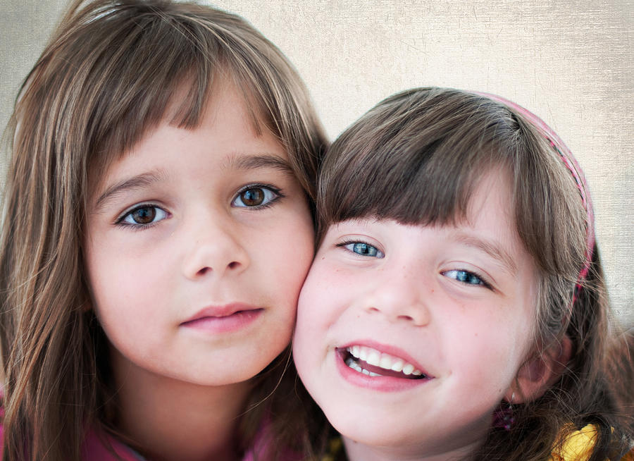 Close-up of two young girls Photograph by Becki Bennett
