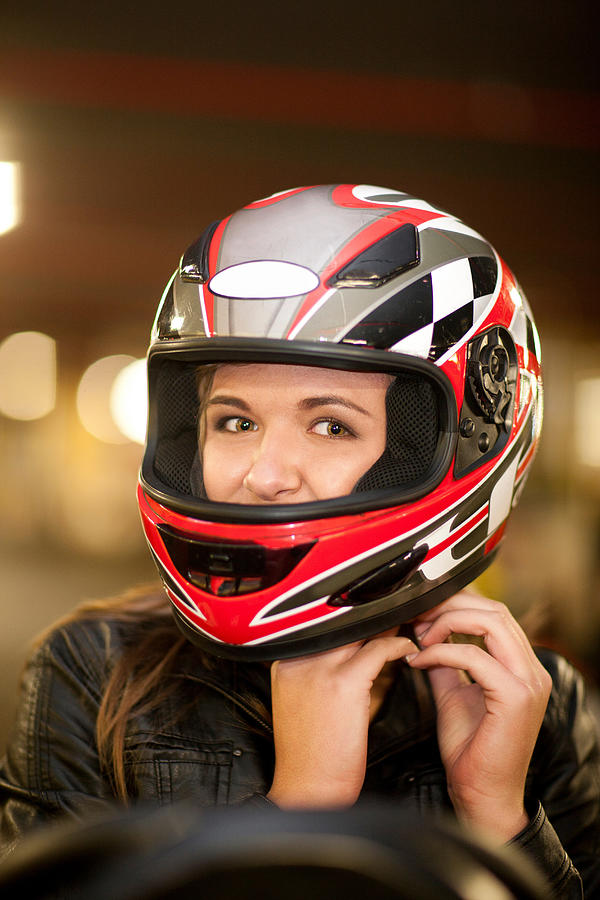 Close up of young woman on go cart Photograph by Zero Creatives