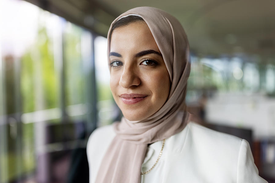 Close-up portrait of a muslim middle eastern businesswoman in office Photograph by Luis Alvarez