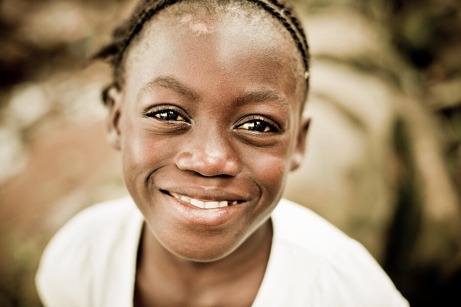 Close-up portrait of a smiling girl Photograph by Himarkley