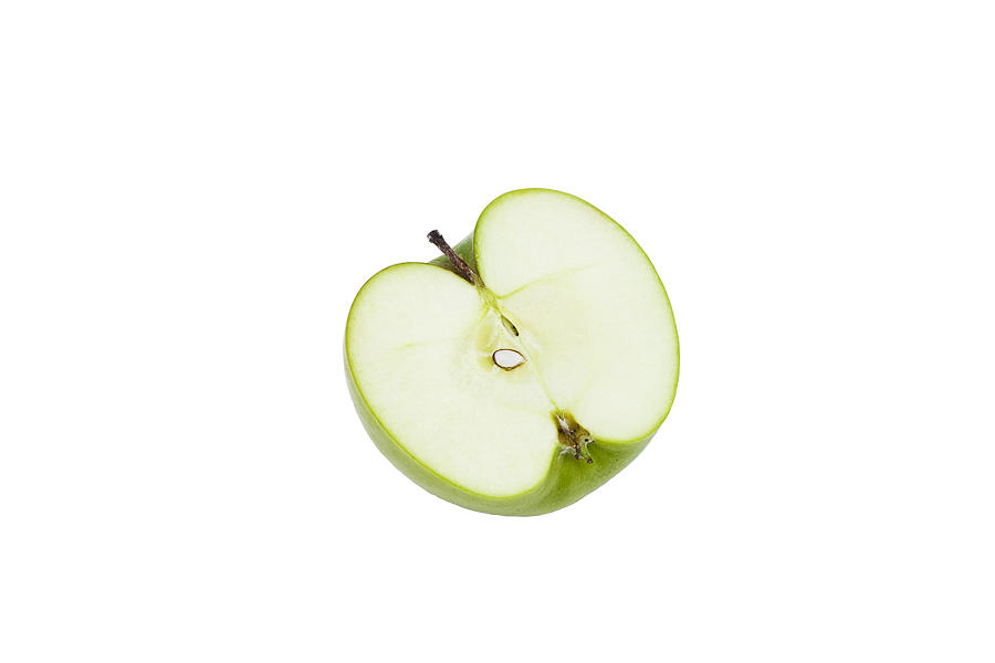 Close-up studio shot of green organic apple cross-section Photograph by Fridholm, Jakob