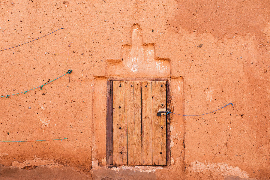 Closed wooden window in traditional moroccan house with wall in terracotta  red color. Shabby texture, background. Arabic style in architecture.  Photograph by Julien - Pixels