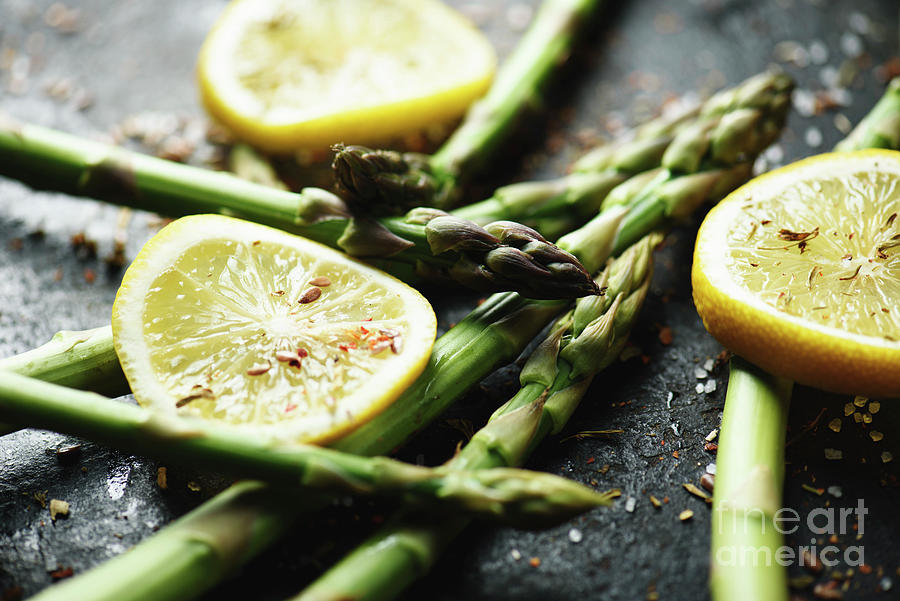 Closeup of asparagus with lemon and spices Photograph by Jelena Jovanovic