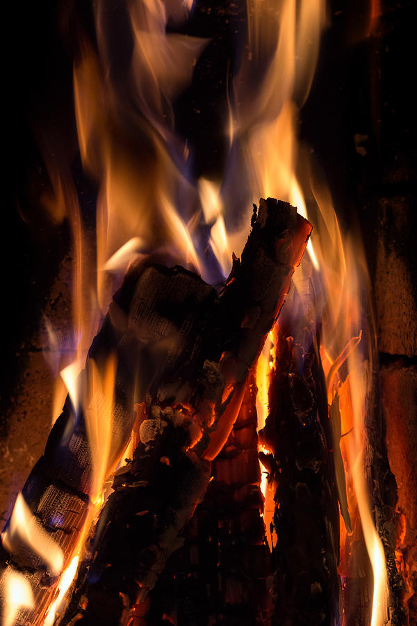 Closeup of burning & flaming firewood in fireplace Photograph by Tuomas A. Lehtinen