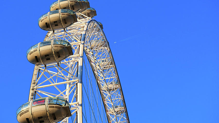 Closeup Of Capsules attached To London Eye and an airplane by Santosh Puthran Closeup Of Capsules attached To London Eye and an airplane by Santosh Puthran