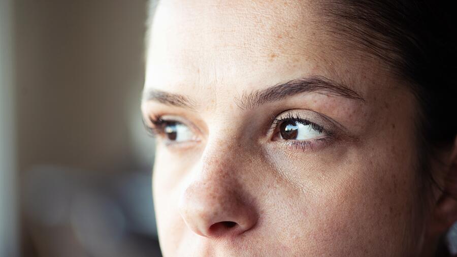 Closeup of woman looking away Photograph by Electravk
