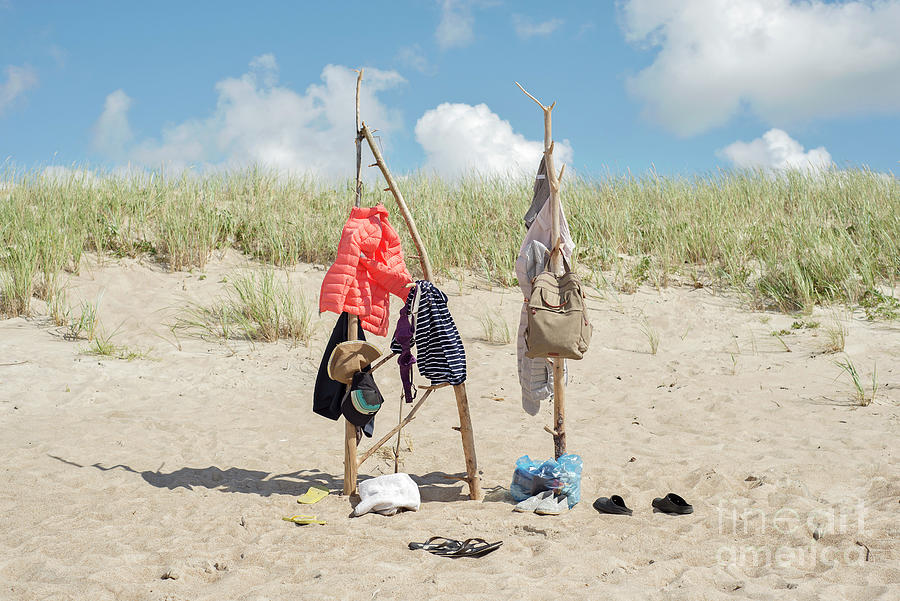 Clothes Hanging On The Wooden Poles At The Beach Photograph by Nerijus ...