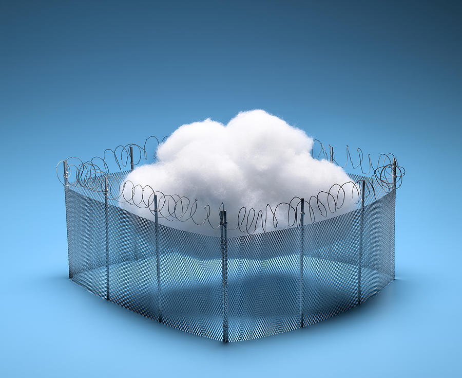 Cloud In Fence Photograph by Jeffrey Coolidge
