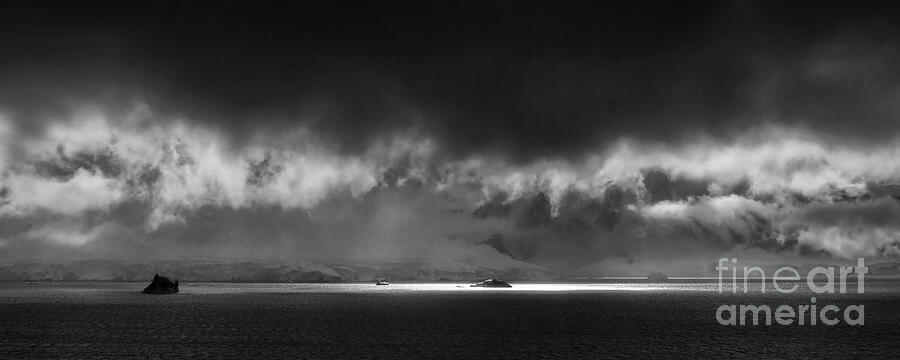 clouds above Paradise Bay Antarctica bw Photograph by Rudi Prott