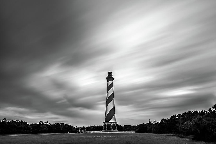 Clouds and lighthouse at Outer Banks, North Carolina Photograph by Robert Miller