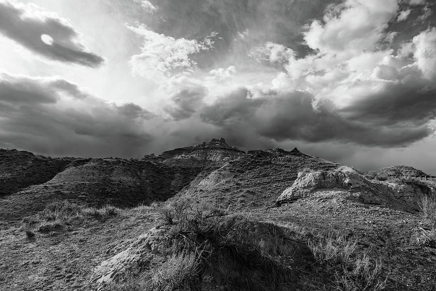 Clouds and mountains at Theodore Roosevelt National Park in North Dakota in black and white Photograph by Eldon McGraw