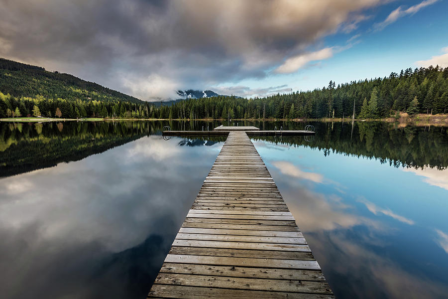 Clouds and reflection at Lost Lake in Whistler Photograph by Pierre Leclerc Photography