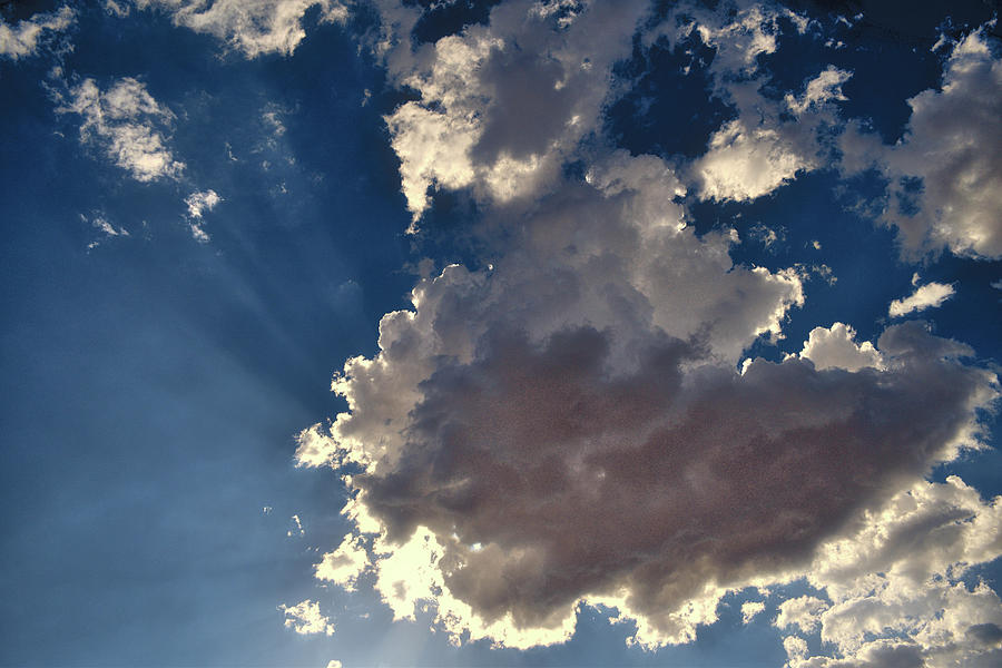 Clouds and Sun Rays Fill the Sky Photograph by Chance Kafka