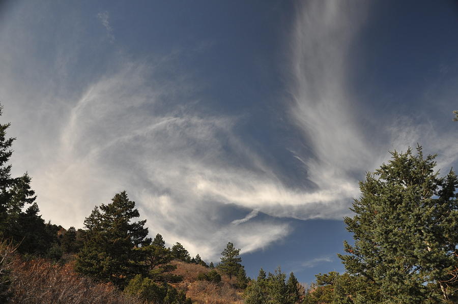 Clouds going in all directions Photograph by LaRue Ebersole - Fine Art ...