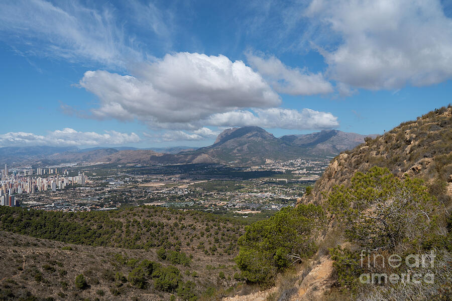 Clouds hover over the mountain landscape Photograph by Adriana Mueller Clouds hover over the mountain landscape Photograph by Adriana Mueller