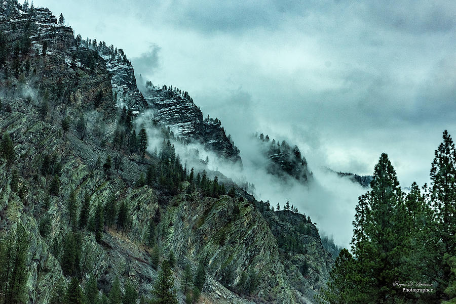 Clouds in Bad Rock Canyon Photograph by Bryan Spellman