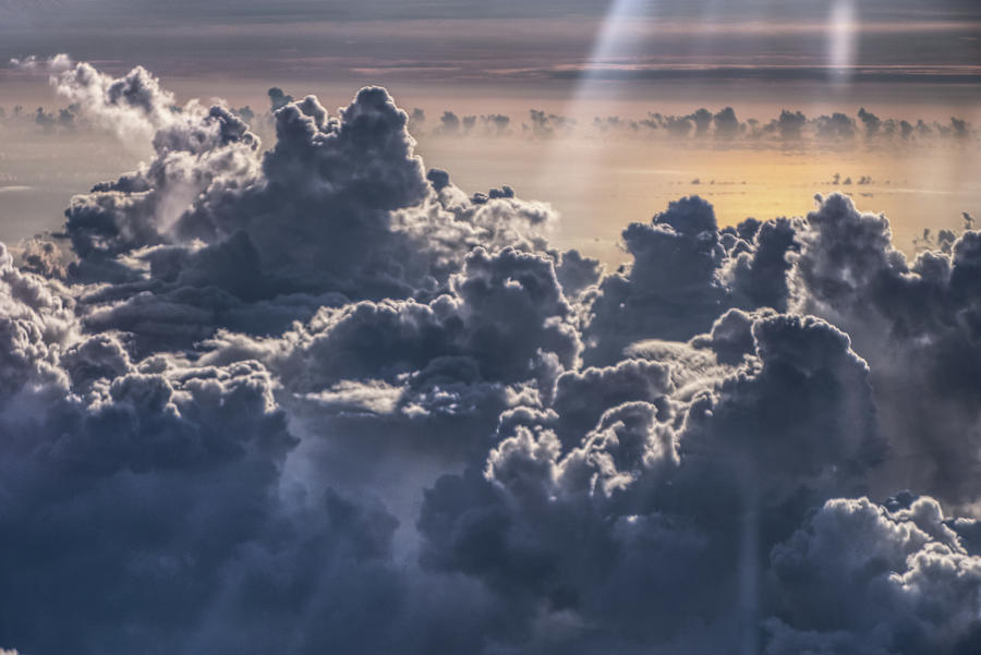 Clouds in Flight Photograph by Eric Hafner