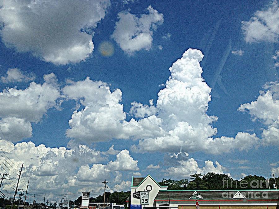 Clouds in May in St. Louis Photograph by Nancy Kane Chapman