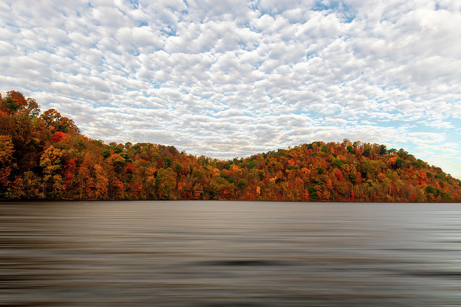 Clouds like cotton balls with fall colors Photograph by Dan Friend