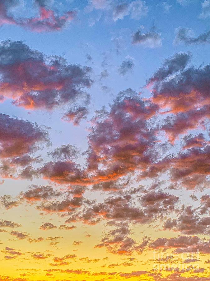 Clouds of Sunrise by Viki Velazquez Clouds of Sunrise by Viki Velazquez
