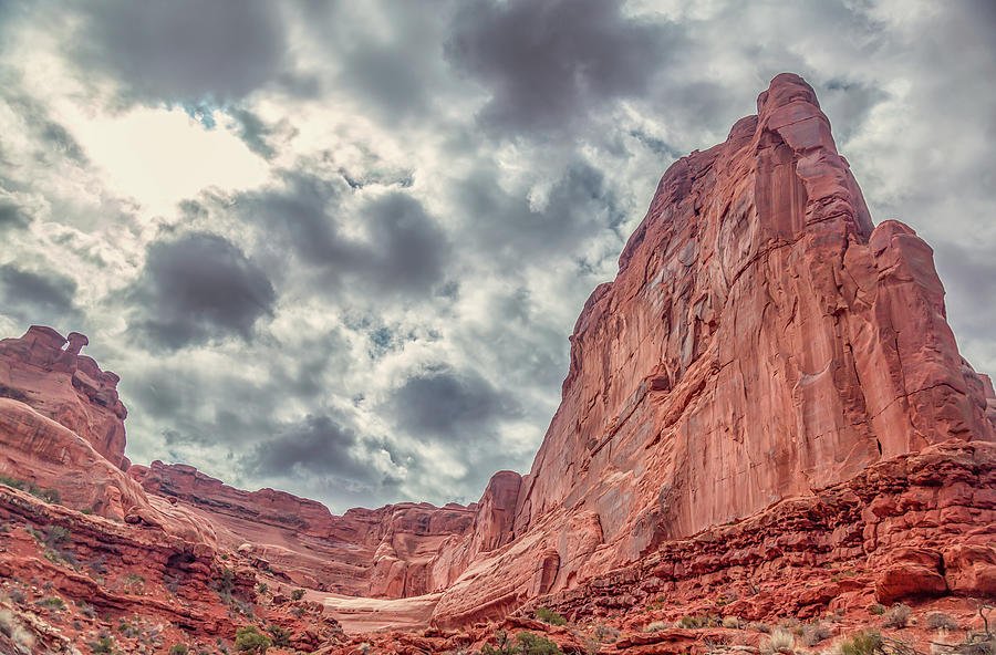 Clouds Over Arches National Park Photograph by Marc Crumpler