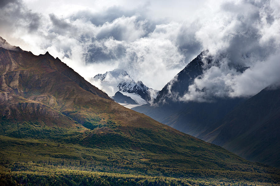 Clouds over mountain range, Sierra, Alaska, USA Photograph by Daniel Chui