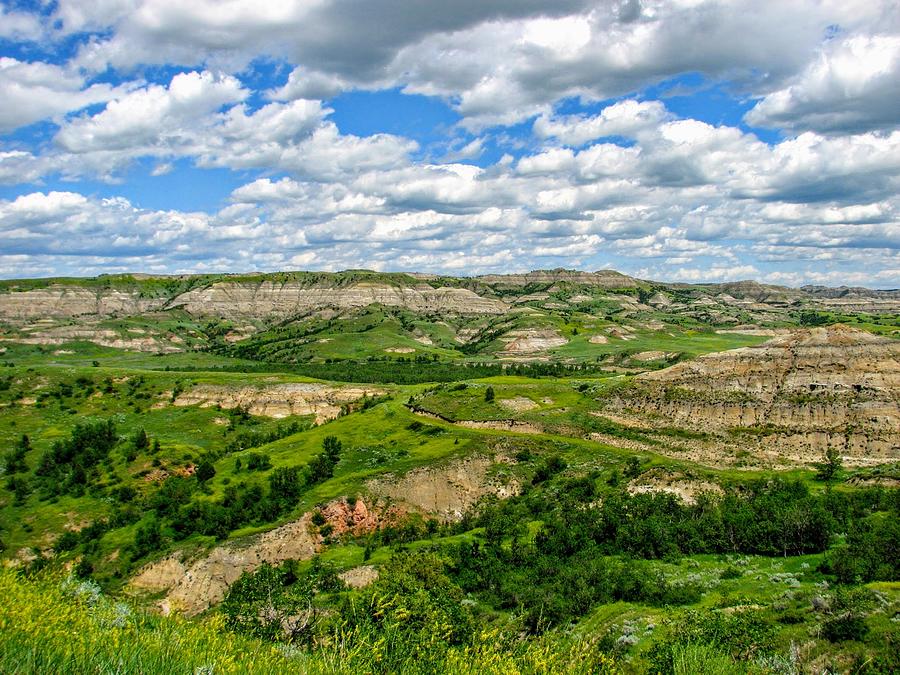 Clouds Over The Badlands Photograph by Amanda R Wright