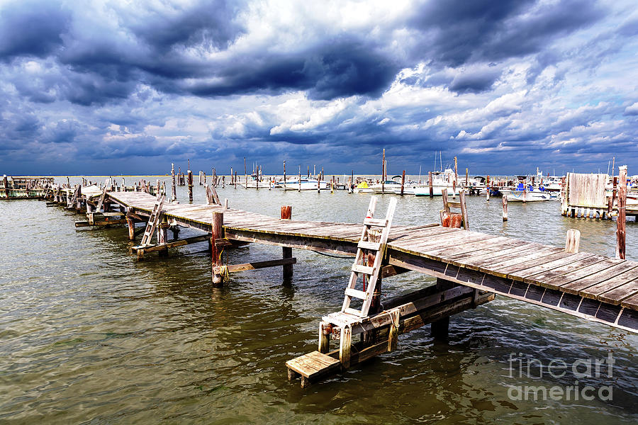 Clouds Over the Dock at Long Beach Island Photograph by John Rizzuto