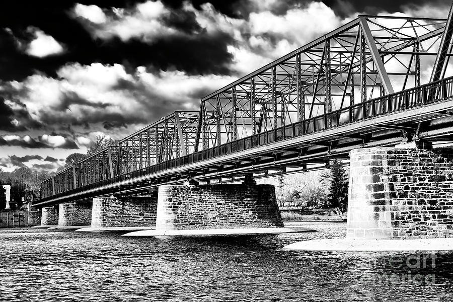 Clouds Over the New Hope Lambertville Bridge Photograph by John Rizzuto