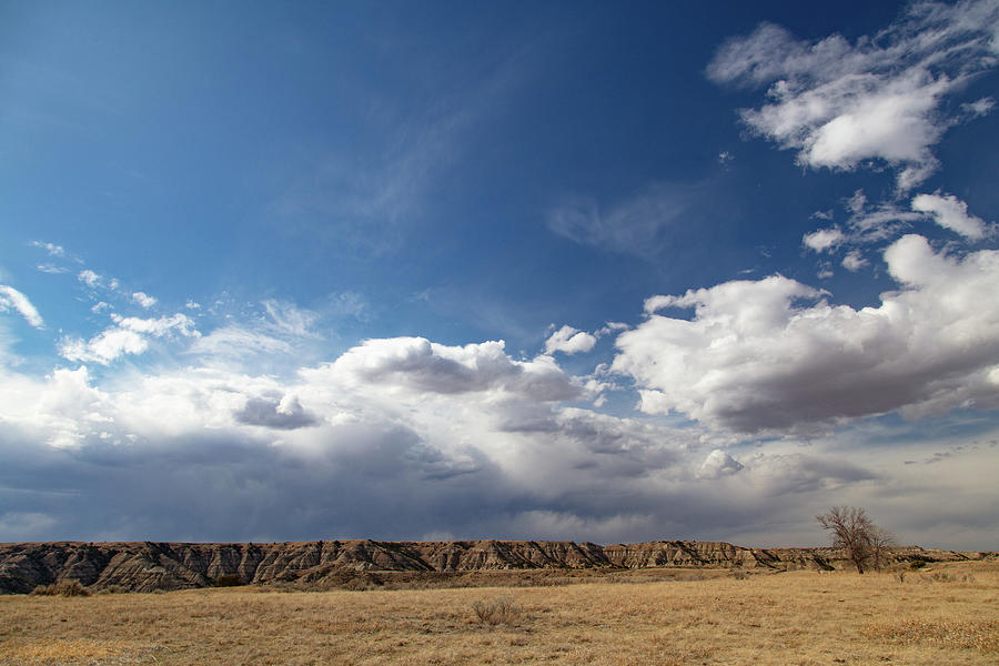 Clouds over Theodore Roosevelt National Park in North Dakota Photograph by Eldon McGraw