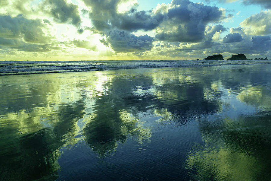 Clouds Reflected In Wet Sand Photograph