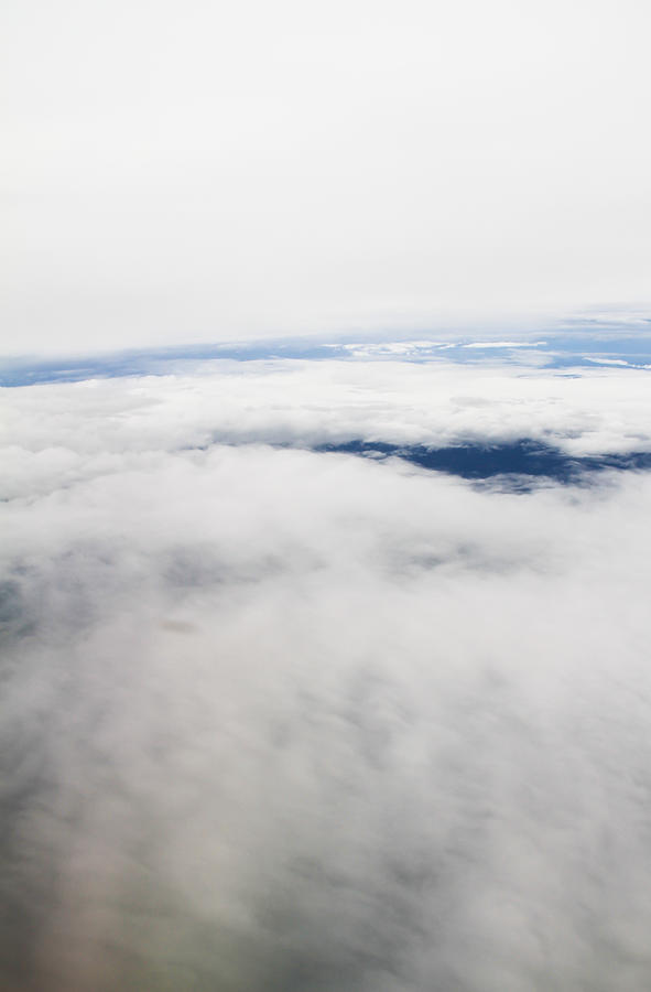 Clouds. view from the window of an airplane flying Photograph by Jukree