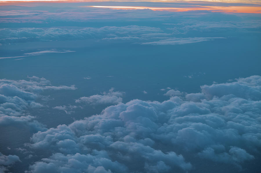 Cloudscape at sunset from an Airplane Photograph by Angelo DeVal
