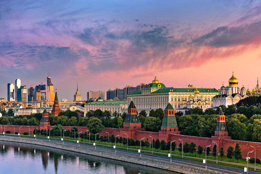Cloudy sunrise over Kremlin wall and Moskva river Photograph by Mordolff