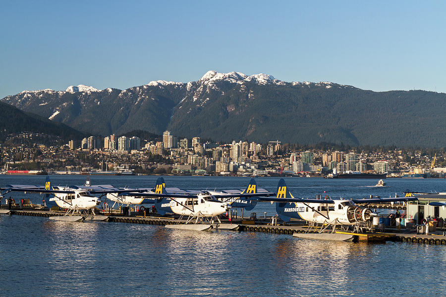 Coal Harbour Seaplanes and North Shore Mountains Photograph by Michael Russell