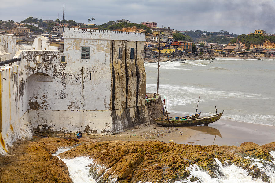 Coast edging wing of Cape Coast Castle Photograph by Merten Snijders