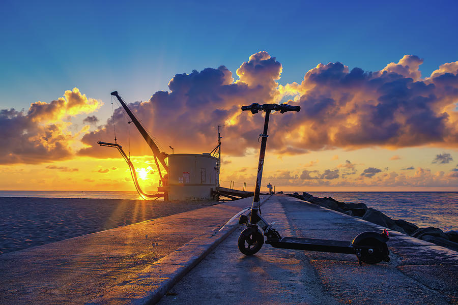 Coastal Dawn with a Modern Twist Escooter at Palm Beach Inlet Photograph by Kim Seng